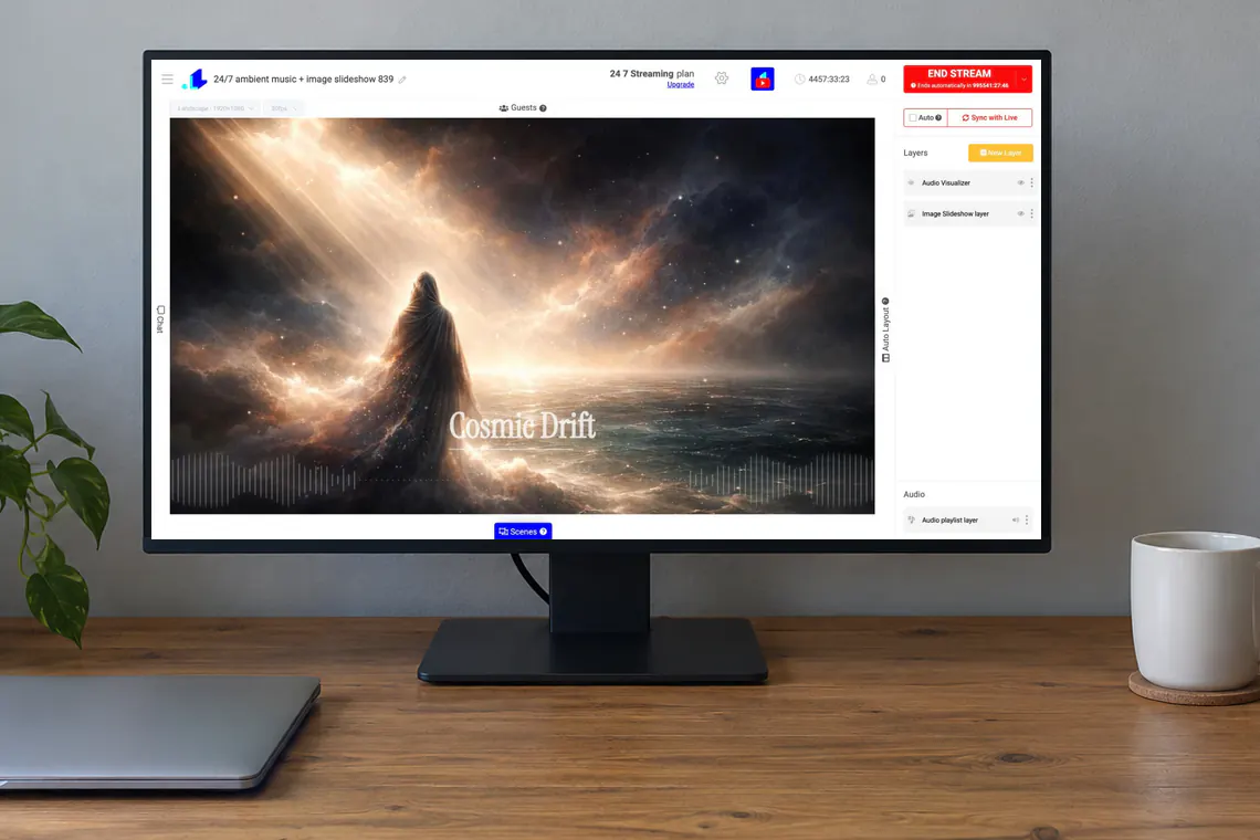 The LiveReacting Studio on a desk monitor, running a 24/7 music stream with an image slideshow, its layers listed on the right
